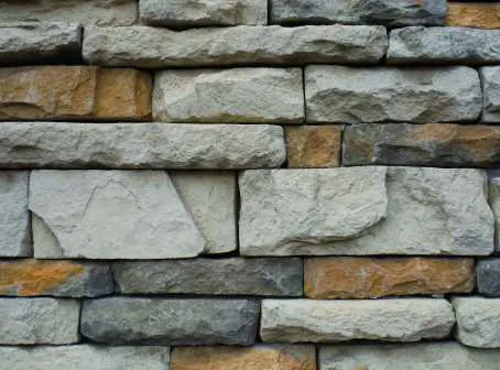 Windows against rough wall